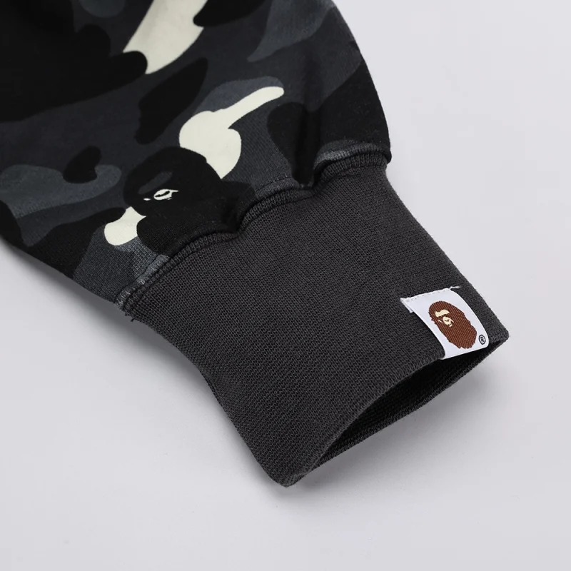 the sleeve black with bape logo