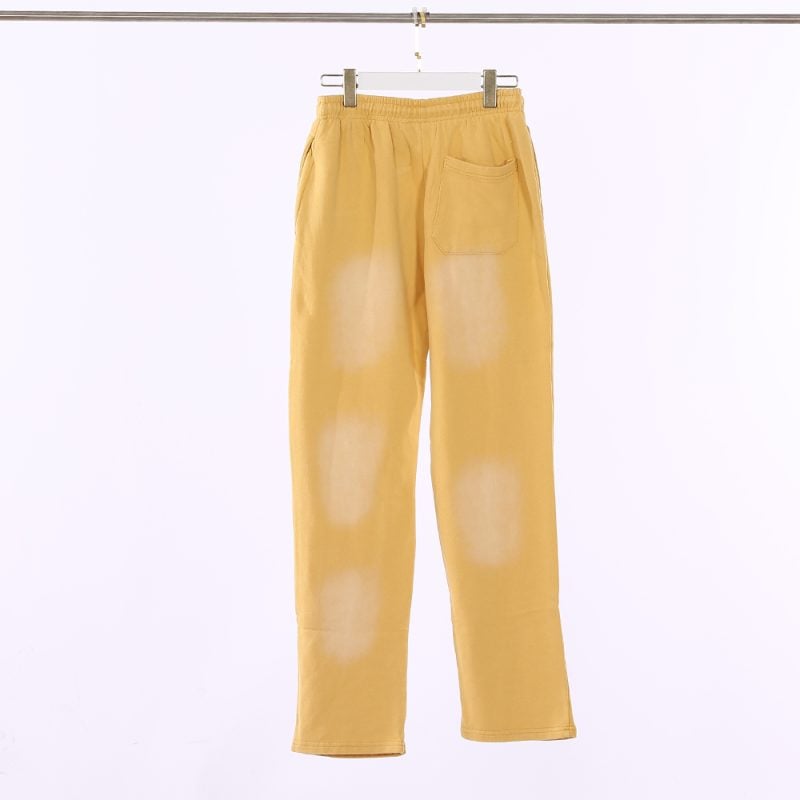 the back side of yellow pant