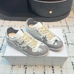 Maison Graffiti ‘Replica’ sneakers