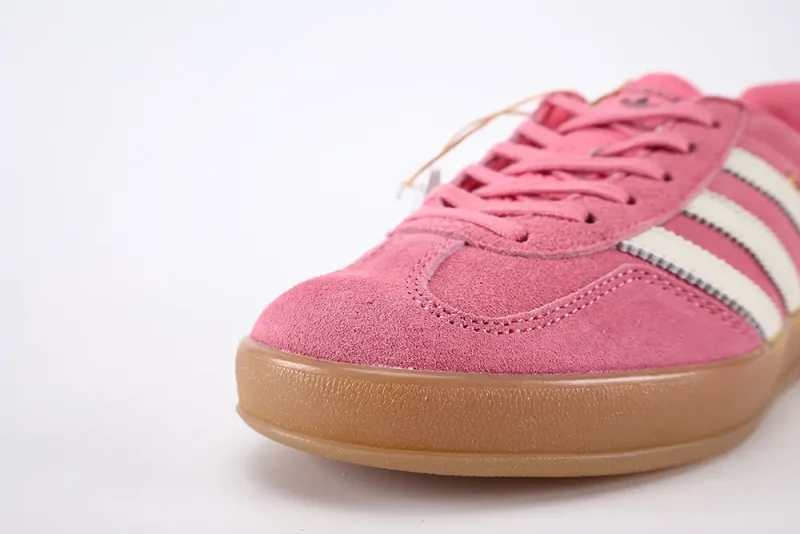 a pink and black shoe toe box