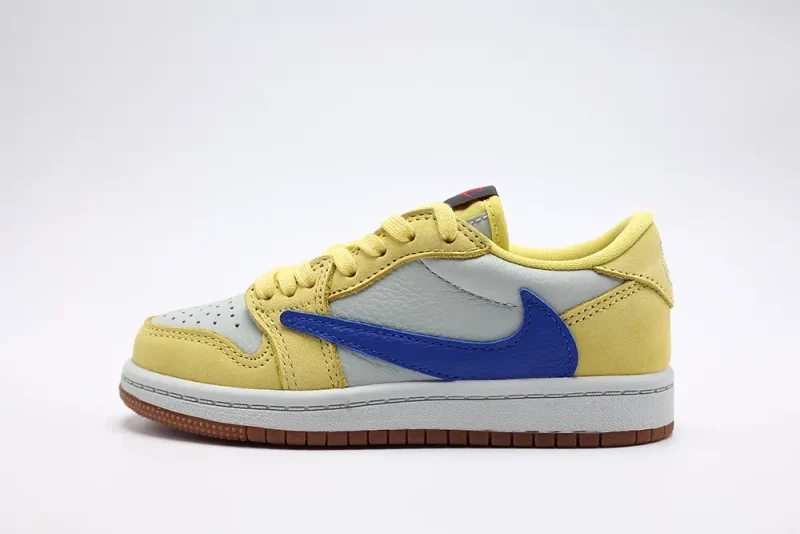 the left side of Jordan Kids x Travis Scott Air Jordan 1 Retro Low OG SP "Canary"