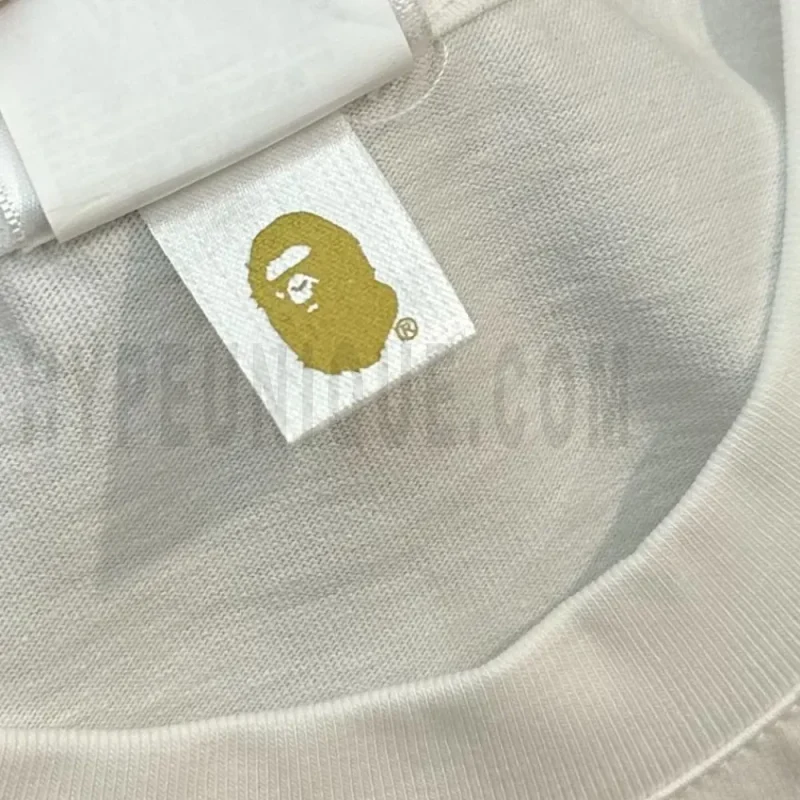 Neckline tag close-up, displaying garment care symbols and brand information with fashion-forward presentation.