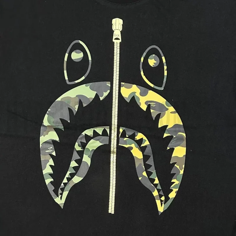 Close-up of the T-shirt print details of the front of the black clothes.