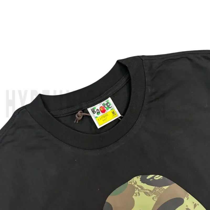 Neckline tag close-up, displaying garment care symbols and brand information with fashion-forward presentation.