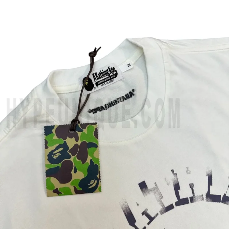Neckline tag close-up, displaying garment care symbols and brand information with fashion-forward presentation.