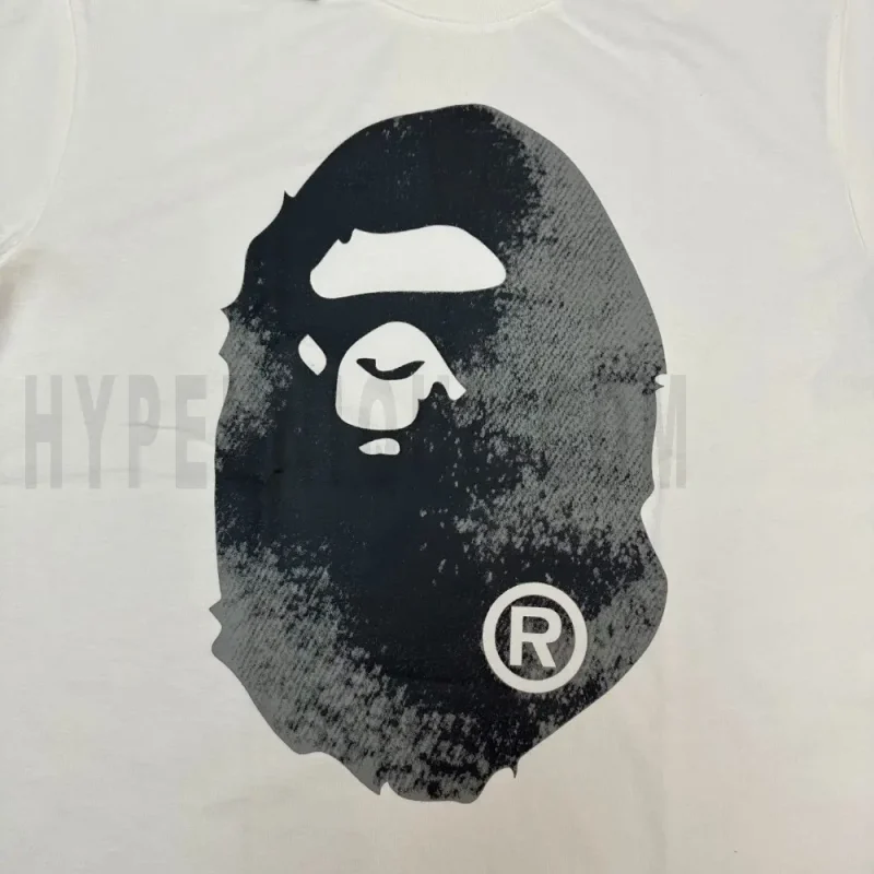 Close-up of the T-shirt print details of the front of the white clothes.