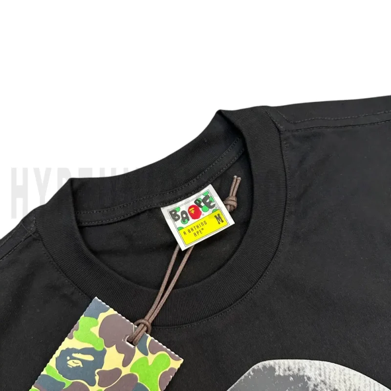 Neckline tag close-up, displaying garment care symbols and brand information with fashion-forward presentation.