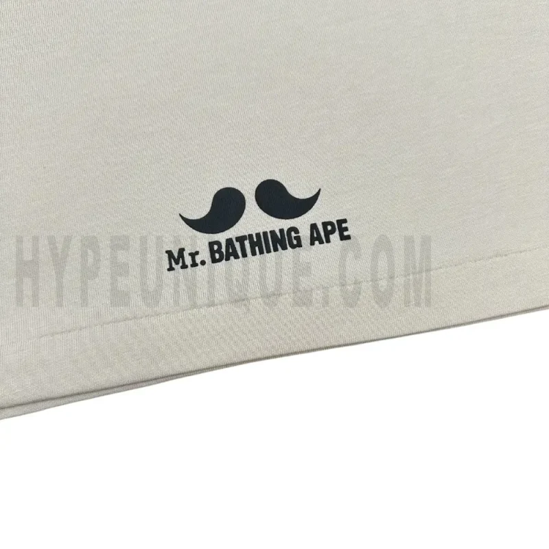 Small graphic detail on the back of the shirt.