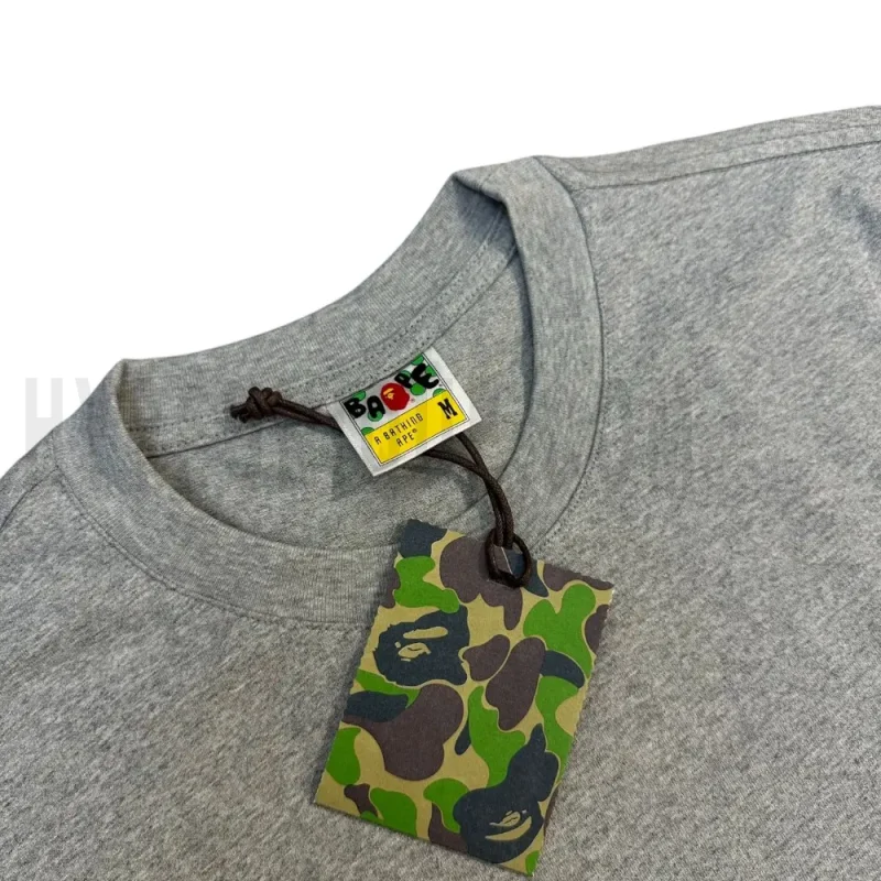 Neckline tag close-up, displaying garment care symbols and brand information with fashion-forward presentation.