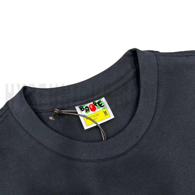 Neckline tag close-up, displaying garment care symbols and brand information with fashion-forward presentation.