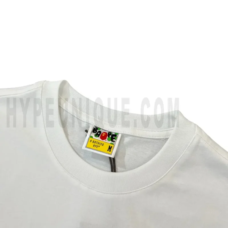 Neckline tag close-up, displaying garment care symbols and brand information with fashion-forward presentation.