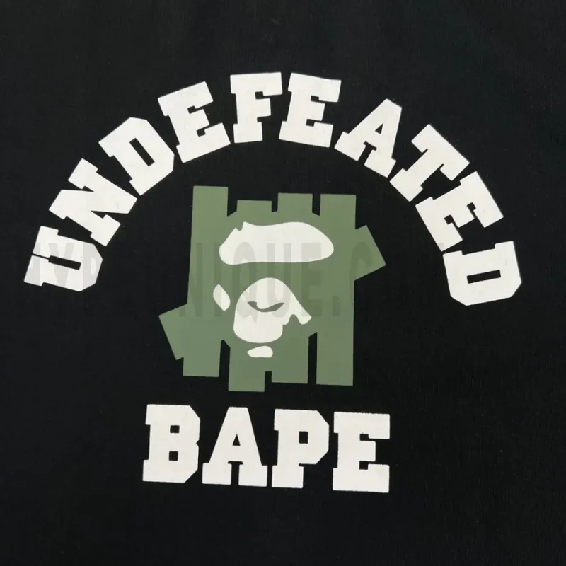 Close-up of the T-shirt print details of the front of the black clothes.