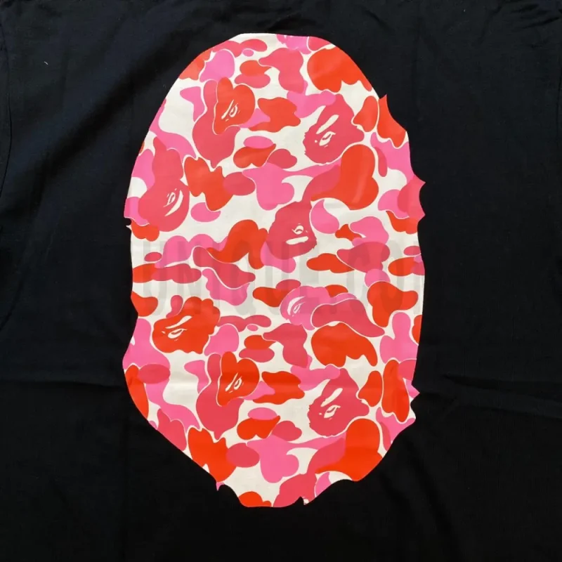 Detailed shot capturing the graphic print on the back tee's back panel.