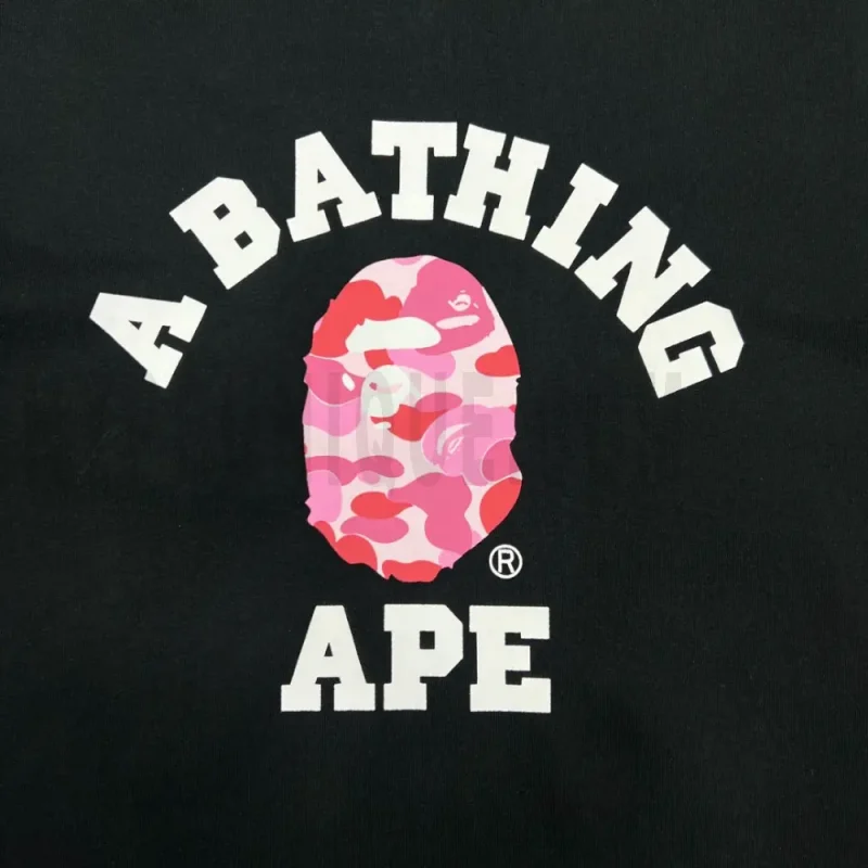 Detailed shot capturing the graphic print on the black tee's front panel.