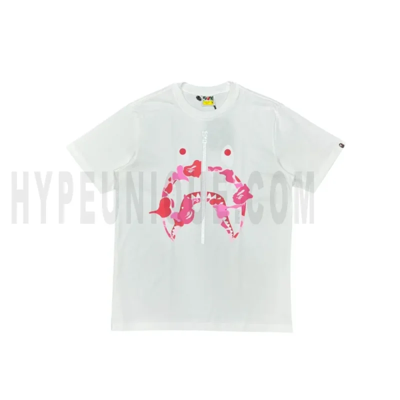 The white shirt with a pink graphic