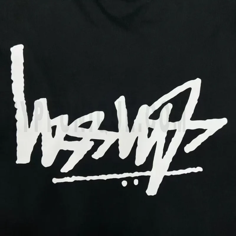 Close-up of the T-shirt print details of the back of the black clothes.