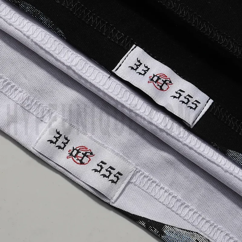 Clean hemline finish with a modern cut, highlighting the T-shirt's streetwear aesthetic.