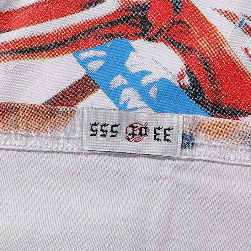 Clean hemline finish with a modern cut, highlighting the T-shirt's streetwear aesthetic.