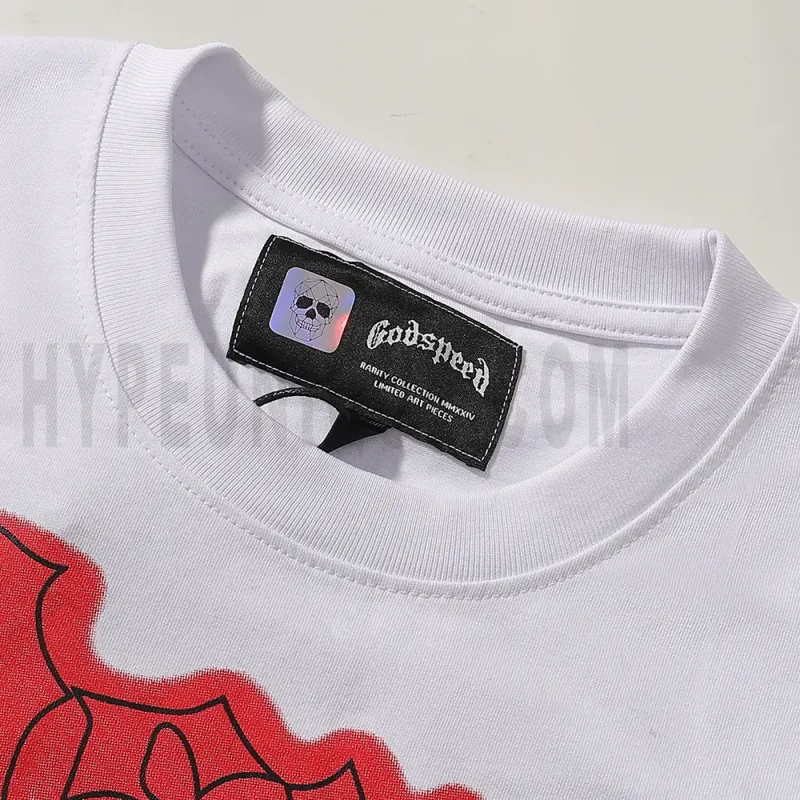 Close-up of the T-shirt's neckline tag, showcasing wash care instructions and brand details in a fashion design.
