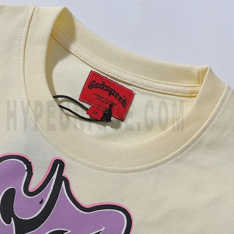 Close-up of the T-shirt's neckline tag, showcasing wash care instructions and brand details in a fashion design.