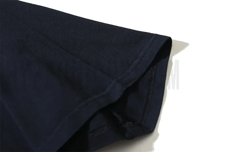 Precision cutting and sewing techniques on sleeves.