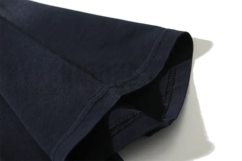 Precision cutting and sewing techniques in sleeve.