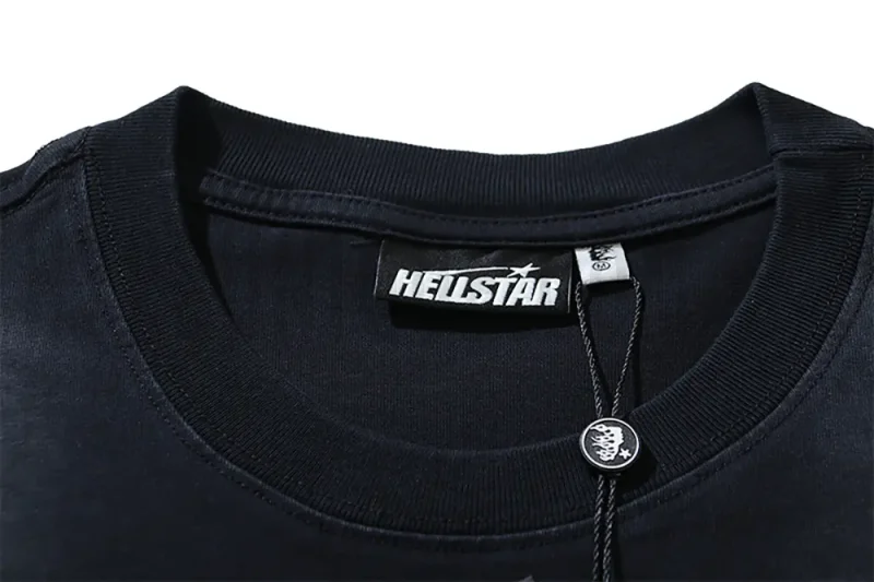Close-up of the T-shirt's neckline tag, showcasing wash care instructions and brand details in a fashion design.