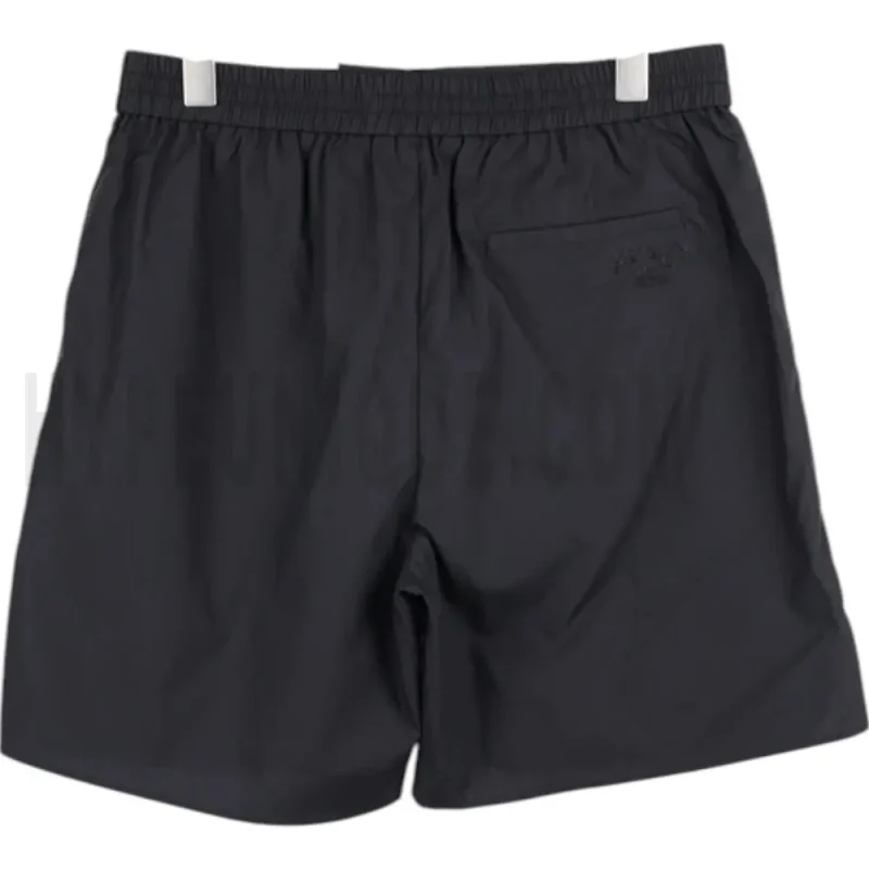 The back of the black pants