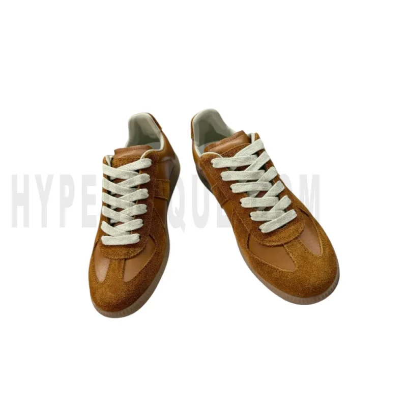 The front of the brown shoes