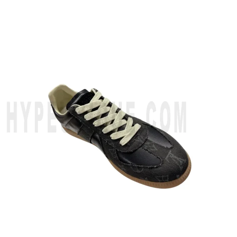The left of the black shoes