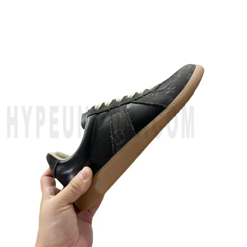 The right side of the black shoes