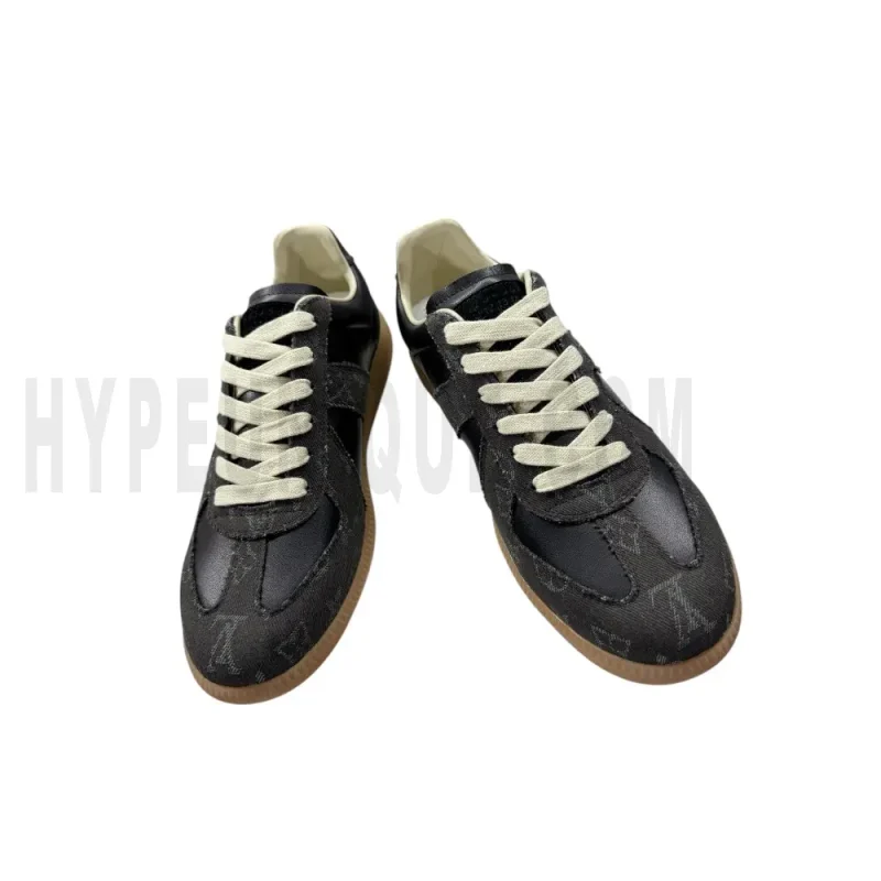 The front of the black shoes
