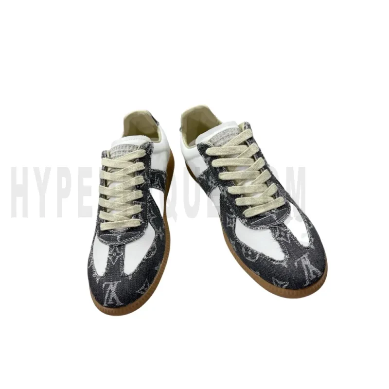 The front of the white and dark gray shoes