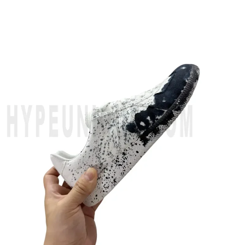 The right side of the white shoes