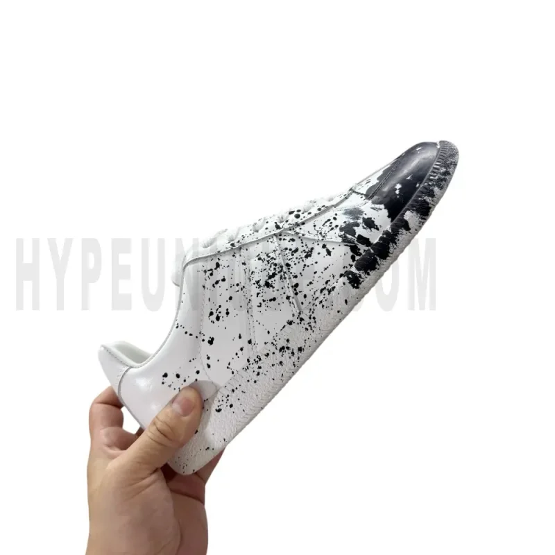 The right side of the white shoes