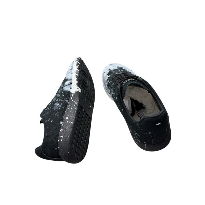 The inside of the black shoes