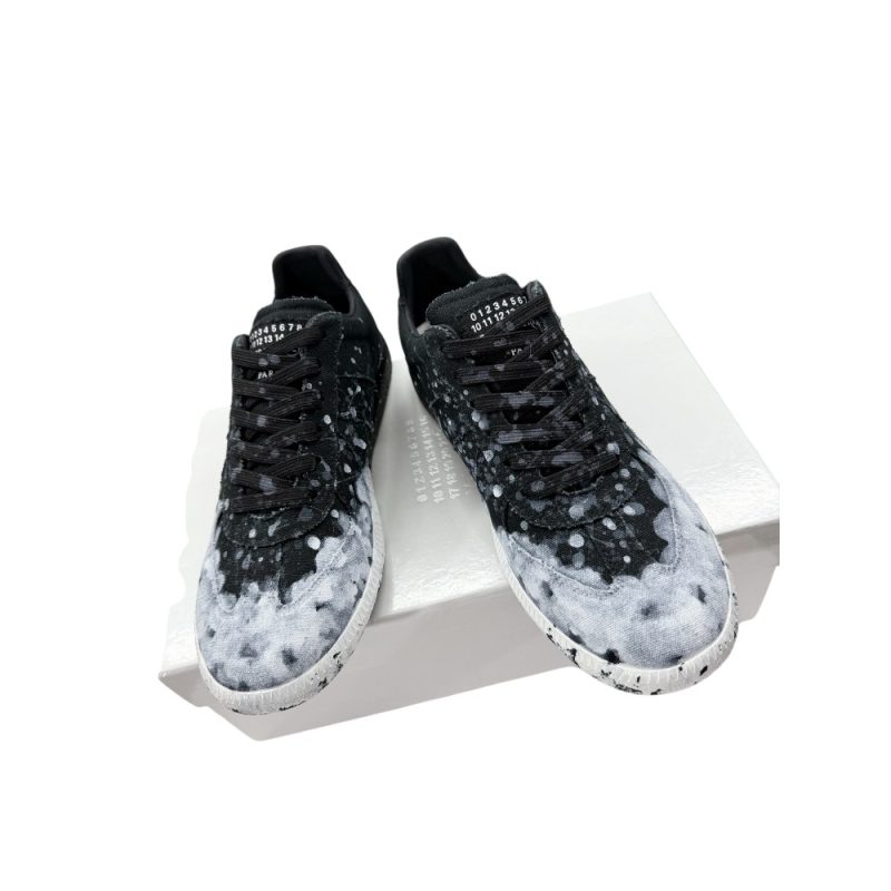 The front of the black shoes
