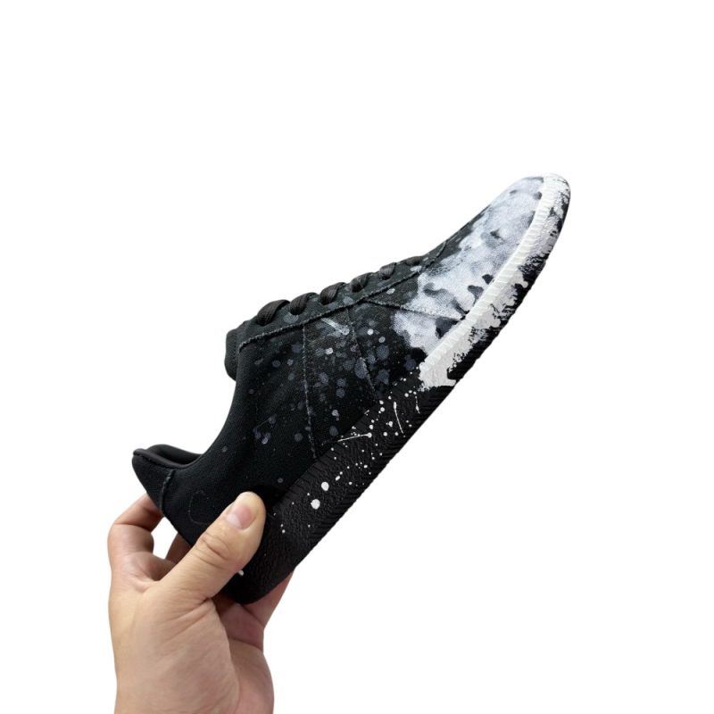 The right side of the white shoes