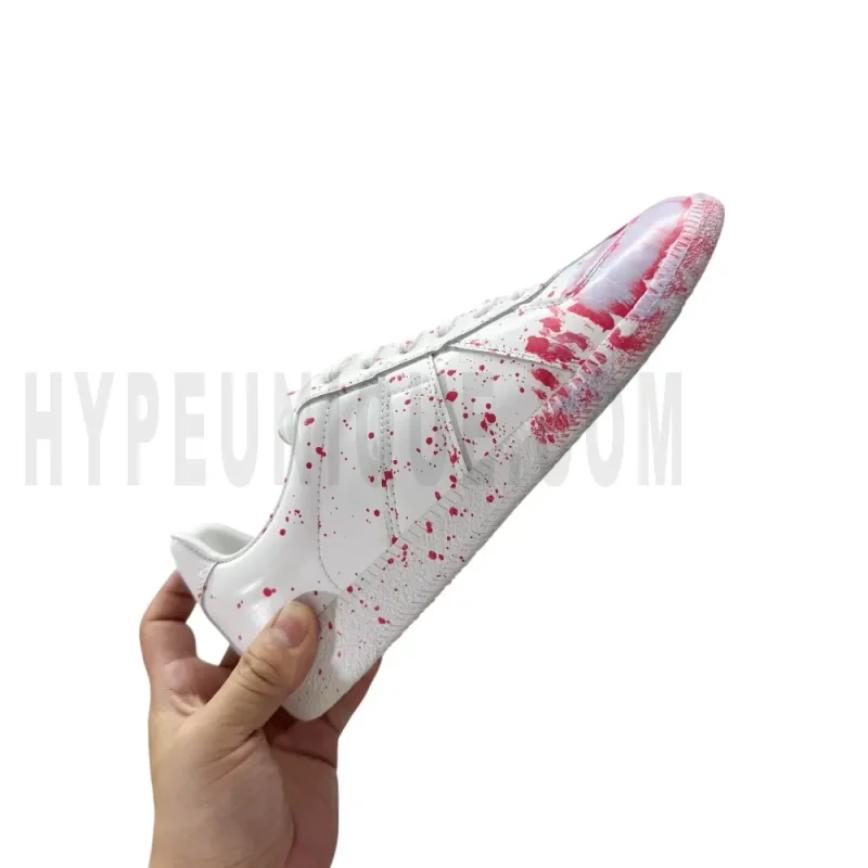 The right side of the white shoes