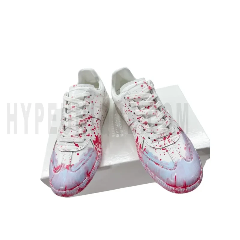 The front of the white shoes