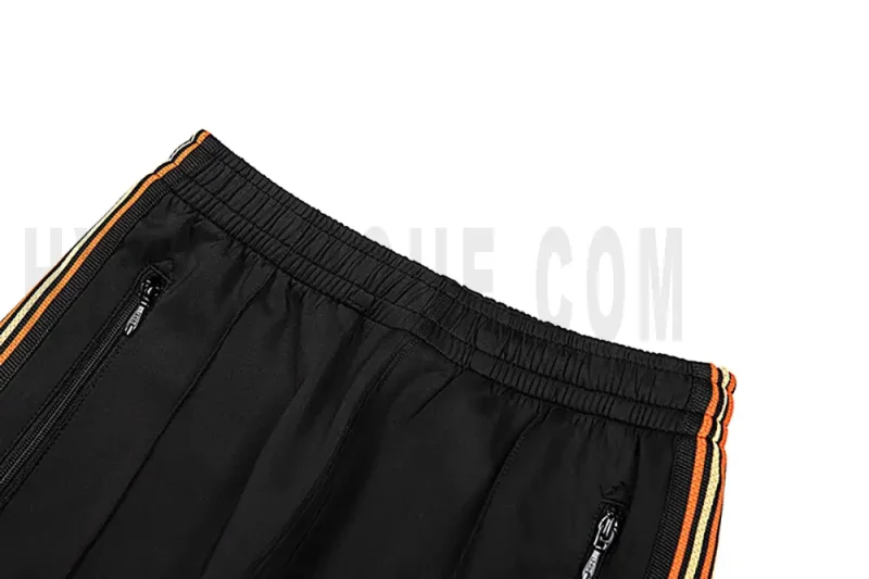 Back detail view of the black pants.