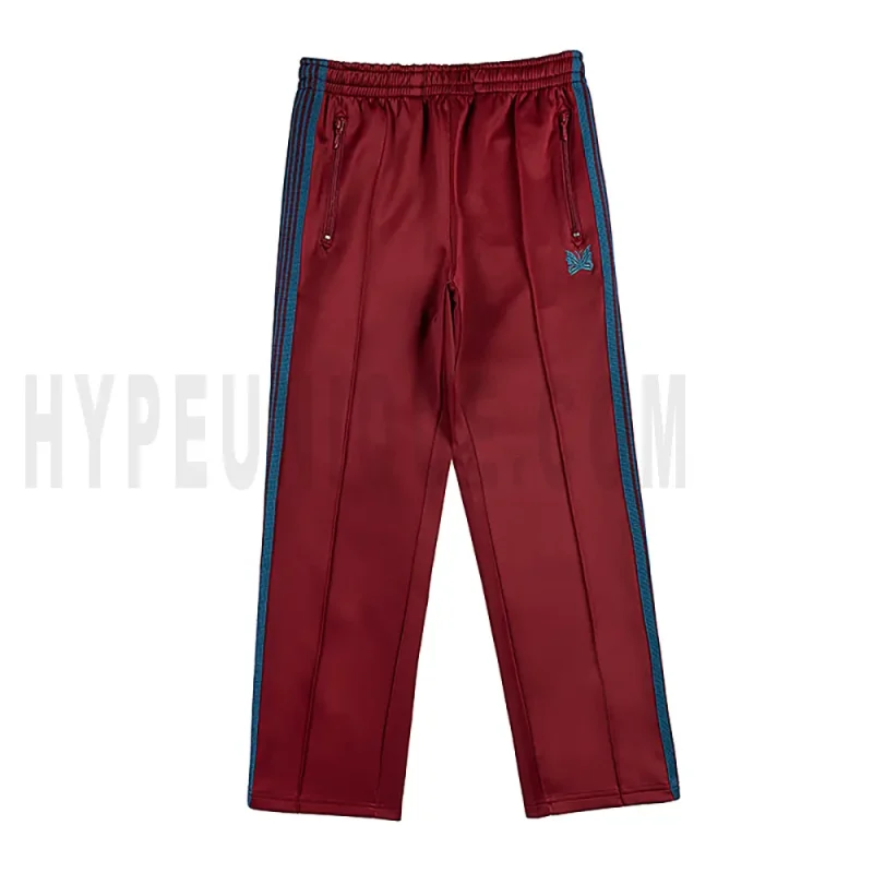 The front of the dark red pants