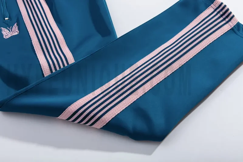 Side stripe detailing on dark blue pants