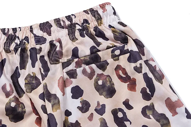 Detail of the back pocket on the track pants.