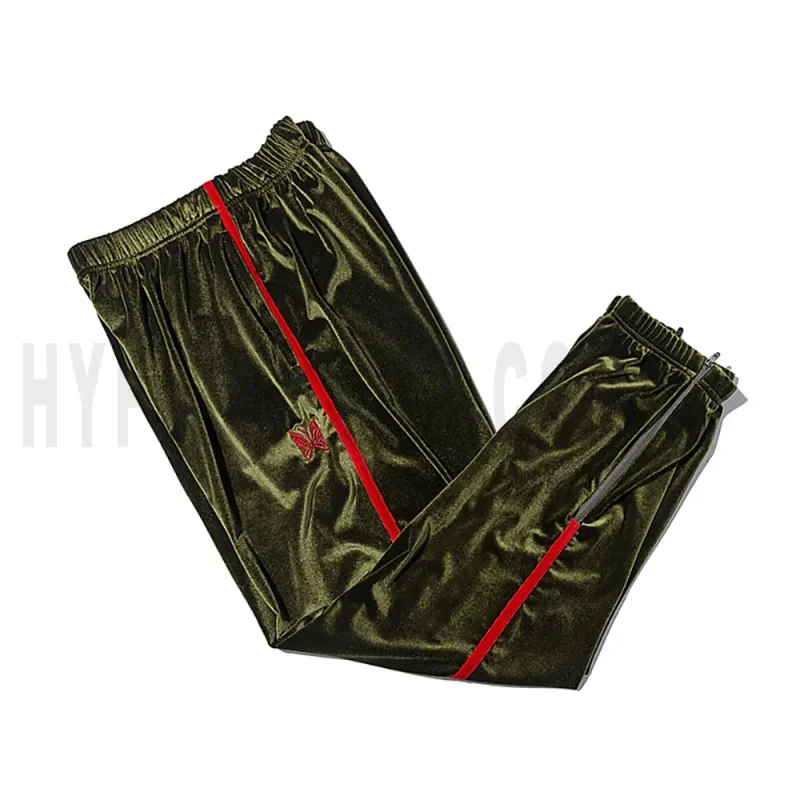 Side view of green track pants