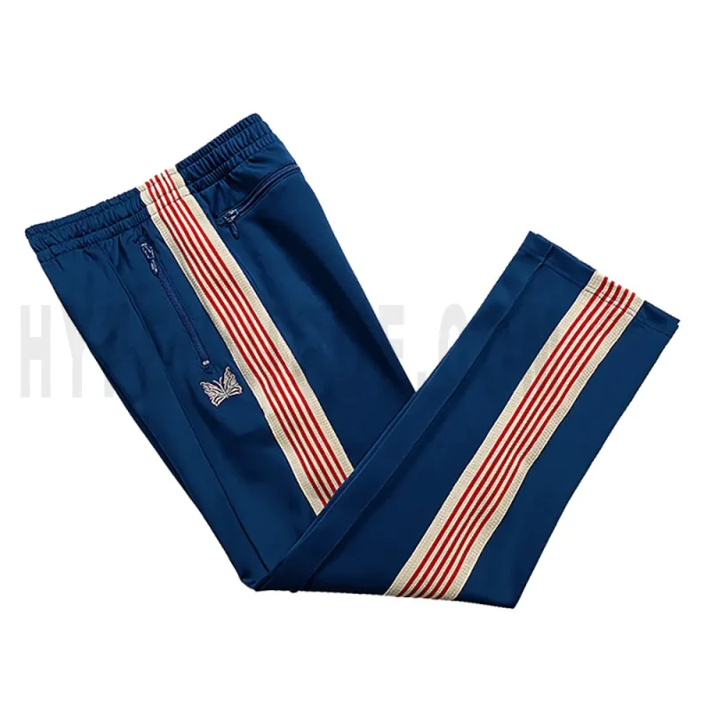 Side view of blue track pants