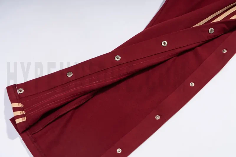 Snap-button pant legs of the red pants