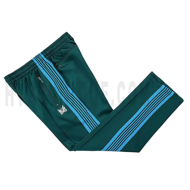 Side view of green track pants.