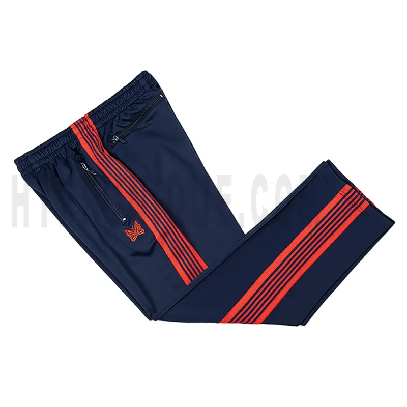Side view of blue track pants.