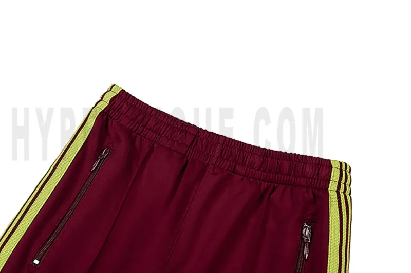 Back detail view of the red pants.